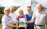 Community activists Sharon Danaher, Seamus Murphy, Sheila Roche, Barry Gilbourne, and Sean O'Sullivan at the Phoenix Project in the Intergenerational Garden in Kilmeedy