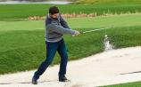 Padraig Harrington testing the bunkers in Adare recently. The course will open in March