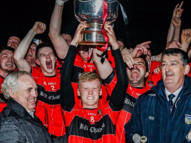 Adare Captain Shane Doherty receives the Daly Cup from Paddy Mulvihill Picture: Keith Wiseman