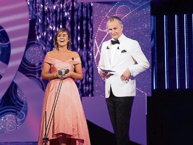 Limerick Rose Kayleigh Maher on stage with D&aacute;ith&iacute; &Oacute; S&eacute; on the first of the live RTE broadcast finals of the Rose of Tralee Picture: Rose of Tralee