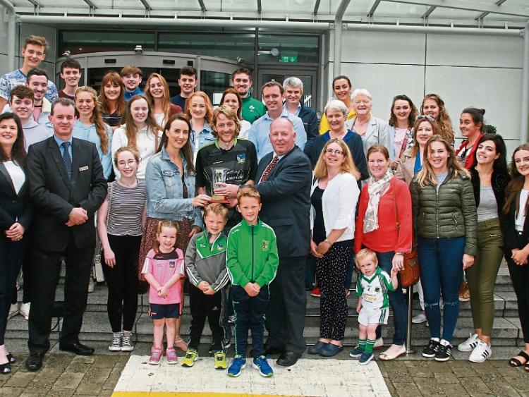 Eugene Phelan, editor, Limerick Leader, award sponsors, presenting the Limerick Person of the Month award to Fr Chris O'Donnell