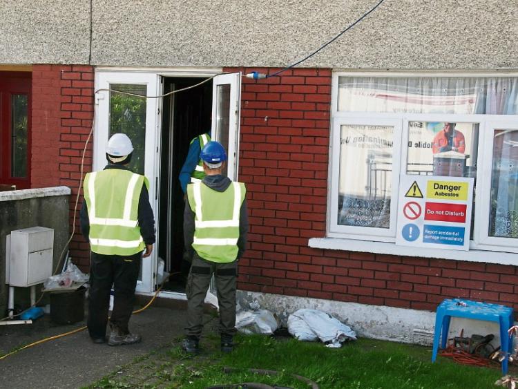 &lsquo;Danger asbestos&rsquo;: Contractors commence the removal of the material from homes in Moyross this week Picture: Adrian Butler 