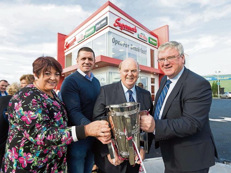 Una McDonagh, Alan Quinlan, former Minister for Finance Michael Noonan and Pat McDonagh with the Liam McCarthy Cup at the official opening of Supermacs Ballysimon  Picture: Eamon Ward 