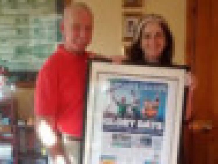 Dympna Tuohy opens her Christmas present from her husband Andy