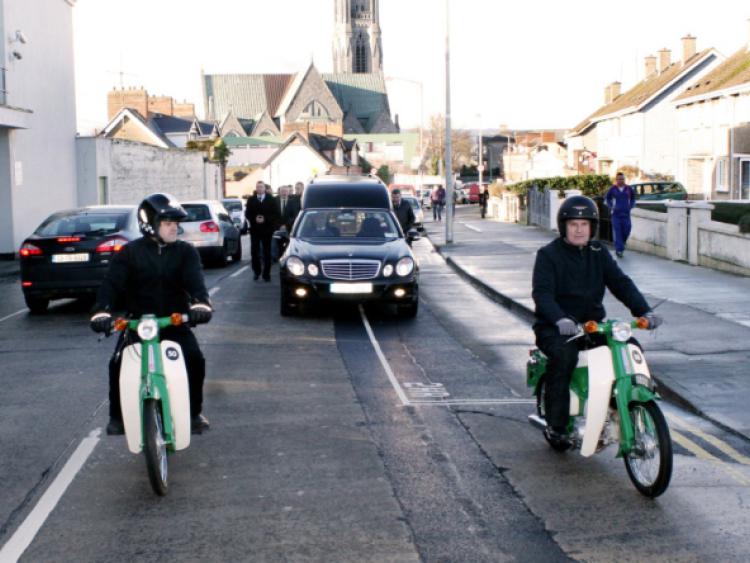 Brian Berkery, Doon, and Jack Leonard, Tipperary, on the 11850 Honda 50s leading the hearse at the funeral of Philip McCormackPicture: Adrian Butler