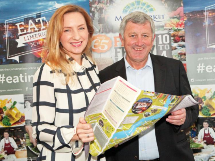 Olivia O'Sullivan launching the Eat in Limerick guide with the sponsor Gerry O'Shea, of GGC Security at the Milk Market. Picture: Dave Gaynor
