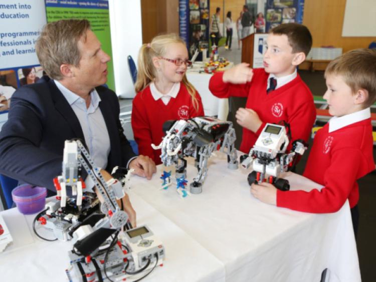 Dr Rene Tristan Lydiksen, Lego Education Europe, with Leona Price , Calvin Ryan and Conor Joyce from St Michael's Infant School, CBS, Sexton Street. Picture: Liam Burke / Press 22