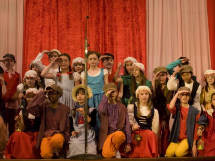 The students in full flow on the stage at the Salesians Primary School in Fernbank, during their terrific end of year performance of the Wizard of Oz! stage show production