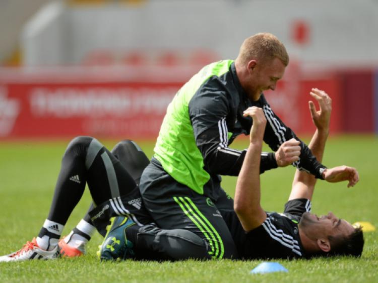 Munster's Keith Earls and Conor Murray joke around at the end of squad training this week ahead of Saturday's crucial Guinness PRO12 clash with Ulster at Kingspan Stadium, 2.40pm