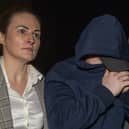Garda Gráinne McLoone and Garda Patrick Kelly accompany