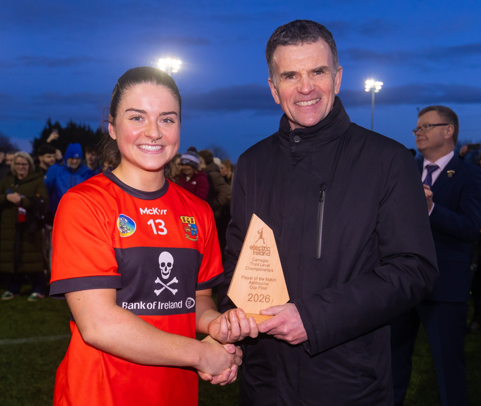UCCs Sarah O’Brien, of Templeglantine and Limerick, receives the Player of the Match award from Pat Fenlon, Electric Ireland, after Sunday's Ashbourne Cup final | PICTURE: ©INPHO/Tom O’Hanlon