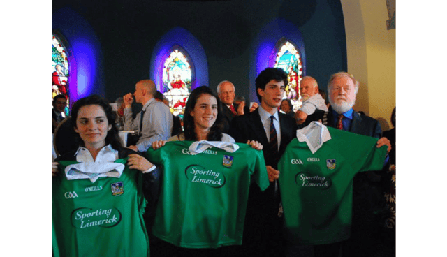 Tatiana Schlossberg, daughter of Caroline Kennedy pictured with her sister, Rose and brother Jack getting a Limerick jersey from Cllr Jerome Scanlon during their visit to Bruff Picture: Declan Hehir