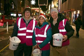 Seamus Fitzgerald and Jane Fitzpatrick from Shannon-based firm AerCap supporting the Novas Christmas sleep-out alongside James Linnane