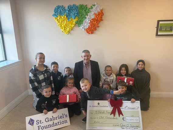Pictured with children from Tara House, Clarina are Owen O'Sullivan and Treasa McAuliffe, the chief executive of St. Gabriel's