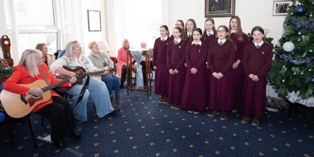 Laurel Hill Coláiste students sang Christmas carols at the launch PICTURE: Press 22