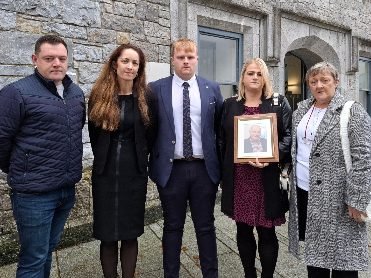 Brian, James, Jennifer and Alice Lowry pictured outside Kilmallock courthouse with solicitor and partner at Callan Tansey, Scarlett O'Sullivan