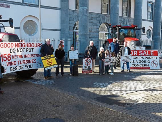 ‘Too big, too close’: Some of the demonstrators at Merchant’s Quay, where Mayor John Moran addressed their concerns | PICTURE: Declan Hehir