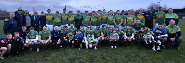 Camogue Rovers players, management team and supporters celebrate their extra-time Limerick Junior 'A' football final win over Adare at Kilmallock on Saturday