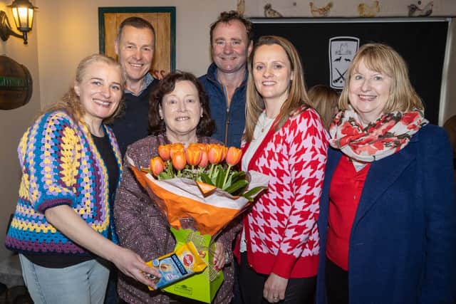 Philomena (pictured below accepting flowers from members of the Clough committee in 2023) gave a beautiful eulogy at his funeral Mass, describing Patsy as her rock.
