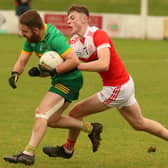 Mungret St Paul's midfielder Jack McCarthy puts St Kieran's corner back Mossie Shine under pressure in round five of the Limerick Senior Football Championship I PICTURE: Brendan Gleeson