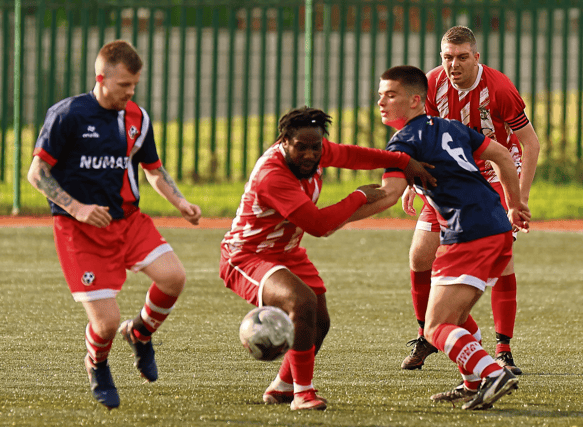 Daniel Ikoghode, of Moyross A, in action against Pat McGrath, of Regional United B, in the Limerick District League Premier 'A' League in Dooradoyle on Sunday | PICTURE: Brendan Gleeson