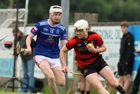Adare's John MacSweeney in action against Mungret St Paul's Mark O'Brien, PICTURE: Brendan Gleeson