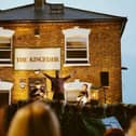 Kingfishr on their perch, performing outside the London pub The Faltering Fullback I PICTURE: Casey King