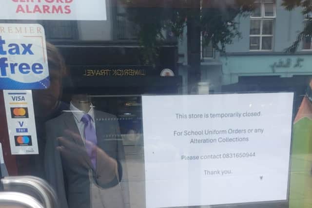 Signs on the door are advising customers that the stores are “temporarily closed”.