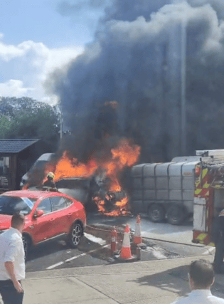 A still from one of the videos of the vehicle fire that have been widely shared on social media