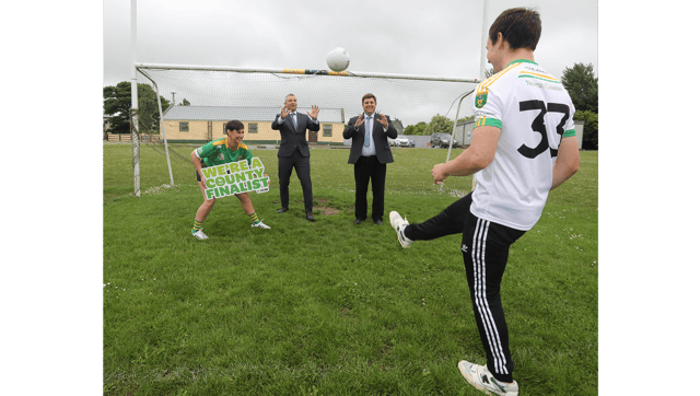 Members of St Kierans GAA club with Minister of State at the Department of Justice Niall Collins, TD and Cian Murphy, CEO, National Lottery Picture: Brendan Gleeson