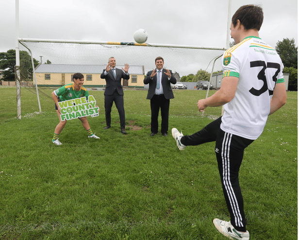 Members of St Kierans GAA club with Minister of State at the Department of Justice  Niall Collins, TD and  Cian Murphy, CEO, National Lottery Picture: Brendan Gleeson
