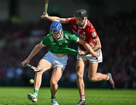 Limerick's Shane O'Brien battles for possession for Cork's Eoin Downey, PICTURE: Sportsfile