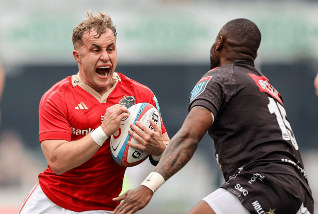 Craig Casey, of Munster Rugby, attempts to get past Aphelele Fassi, of Hollywoodbets Sharks, during their URC clash in Durban last October