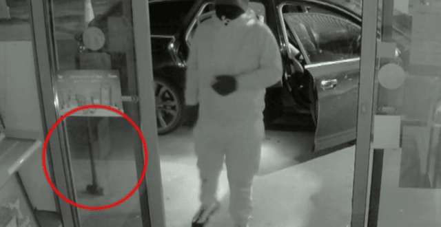 Pictured: One of the suspects was wielding a sledgehammer