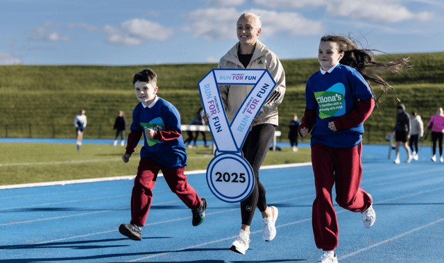 Limerick Olympic legend Sarah Lavin joined by Harvey and Bonnie Curtin | Picture: Keith Wiseman