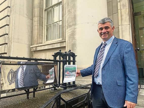 Richard O'Donoghue and Mattie McGrath had to be separated by Dail ushers this Tuesday afternoon