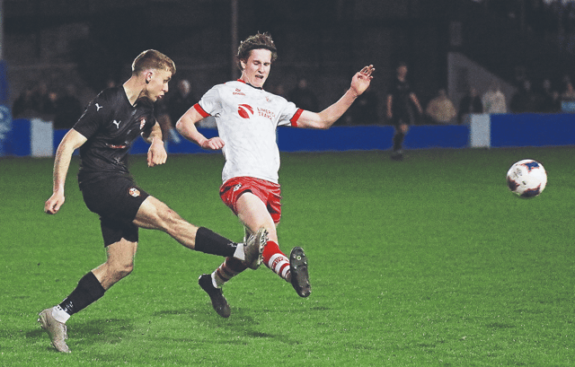 Adam Costelloe, of Aisling Annacotty, in action against Isak Lynch, of Regional United in the Tuohy Cup final at Jackman Park | PICTURE: Brendan Gleeson