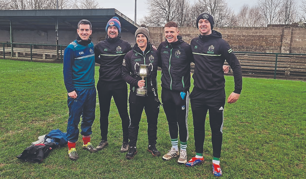 Members of the SMI, Newcastle West senior hurling management team following their Munster final success