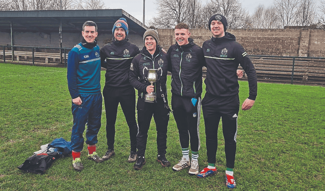 Members of the SMI, Newcastle West senior hurling management team following their Munster final success