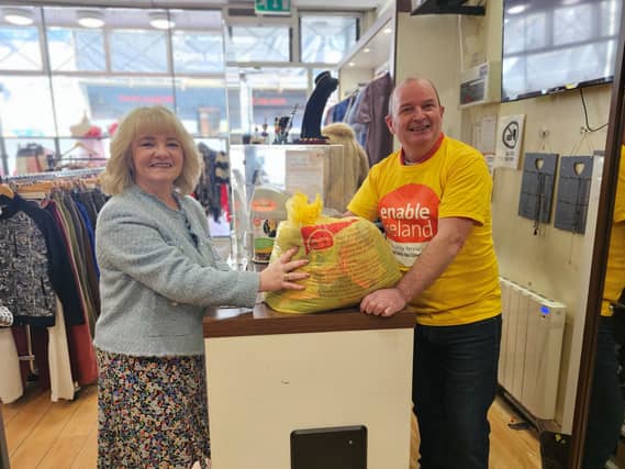 Jenny Smee, Enable Ireland shop manager, and Ken, Enable Ireland shop assistant