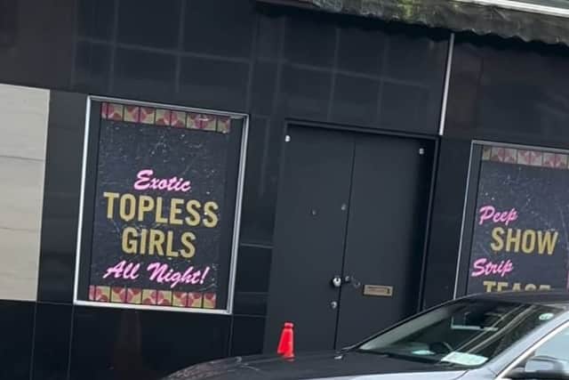 "Girls, Girls, Girls. 18 & Over. Open 5 Nights," reads another with a silhouette of a dancing female.