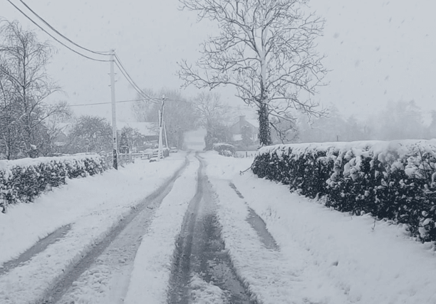 A road covered with inches of snow in Kilmeedy I PICTURE: Limerick City and County Council