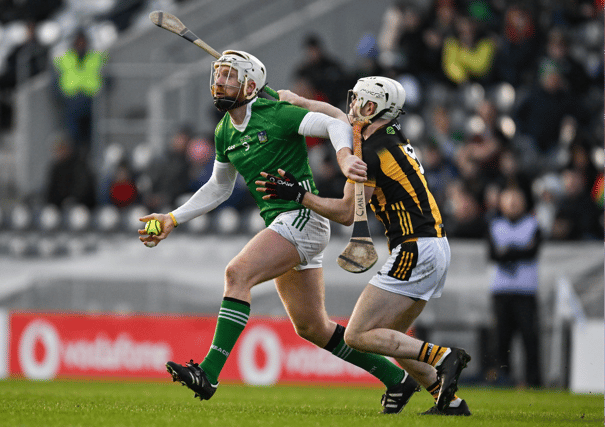 Cian Lynch, of Limerick, is tackled by Jordan Molloy, of Kilkenny, during the 2024 Allianz Hurling League Division 1 semi-final at SuperValu Páirc Uí Chaoimh