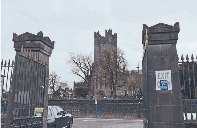 One of a pair of substantial gates and pillars at the Potato Market