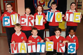 Fifth class students at Scoil Mocheallog, Kilmallock encourage people to get out and have their say this Friday | PICTURE: Adrian Butler
