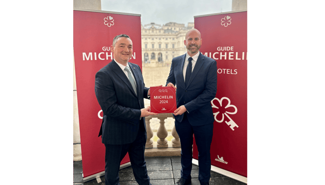 Brendan O'Connor and Kevin Duddy of Adare Manor accepting three Michelin Keys