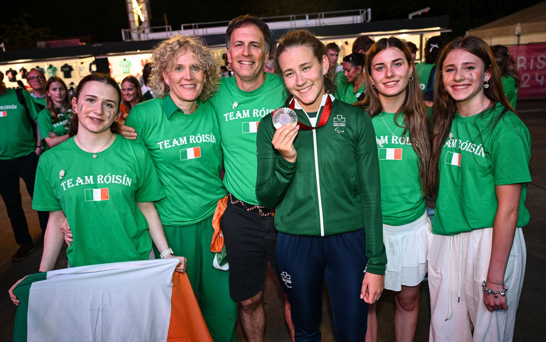 Limerick's Róisín Ní Riain celebrates with her family, from left, Saibh, mother Marian, father Seosamh O'Riain, Sorcha, Maedbh, after her silver medal success in the pool at the Paralympics in Paris