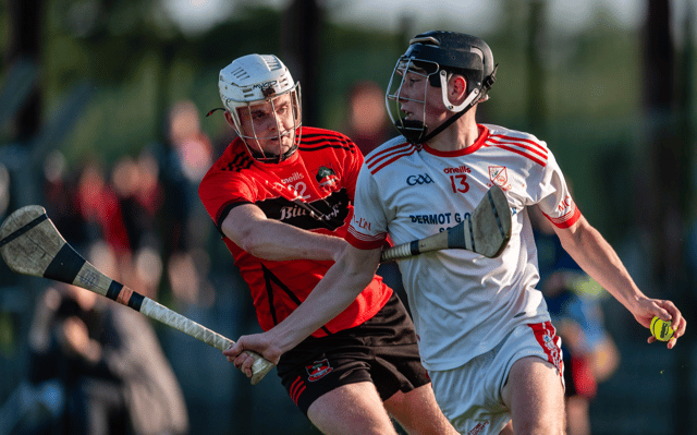Monaleen's Dara Ferland in control of the sliothar against Adare's John McSweeney | PICTURE: Tom Beary