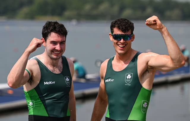 Philip Doyle and Daire Lynch of Team Ireland celebrate after winning bronze in the men's double sculls A final during the 2024 Paris Summer Olympic Games. Photo: Stephen McCarthy/Sportsfile