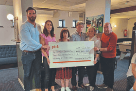 The late John Lyne’s brother-in-law and sister, Ken and Claire Greaney, parents Pat and Theresa Lyne, Eithne and Colin Bell, of the Kevin Bell Repatriation Trust, at the cheque presentation of €25k